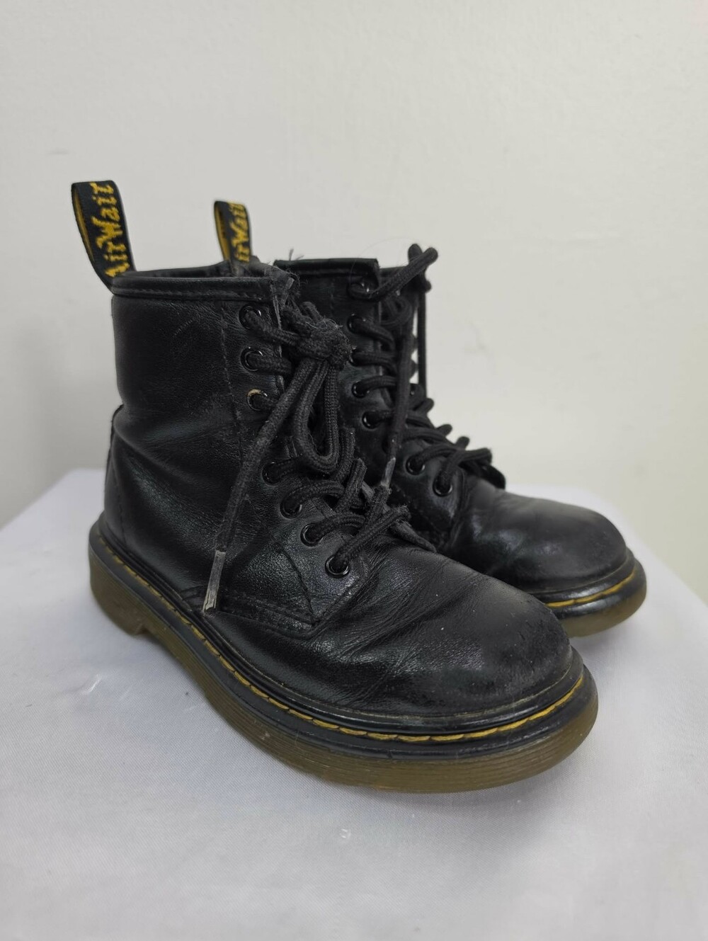 Dr. Martens Kids Black Leather Lace-Up Boots with Yellow Pull Tabs